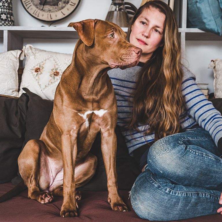 a woman with a dog