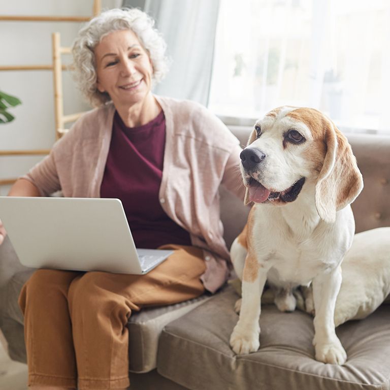 a woman with a dog