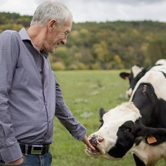 Farmer and cow