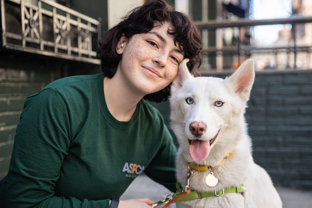 Woman holding dog